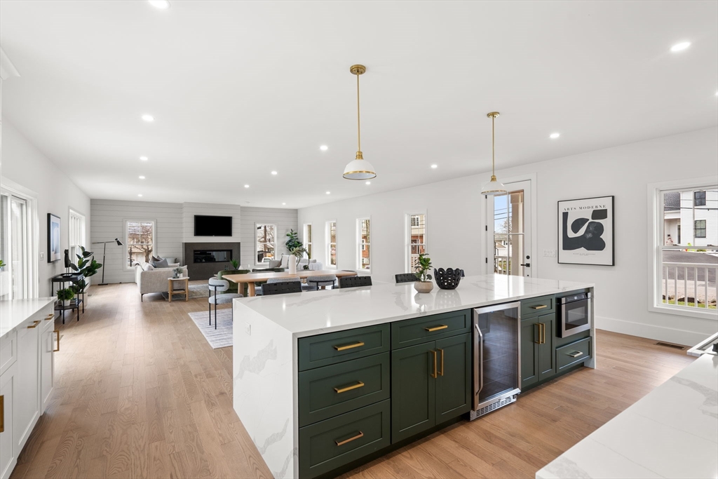 25 Sachem Road Needham, MA 02494 - Photo 9 of 40 a kitchen with sink stove and cabinets