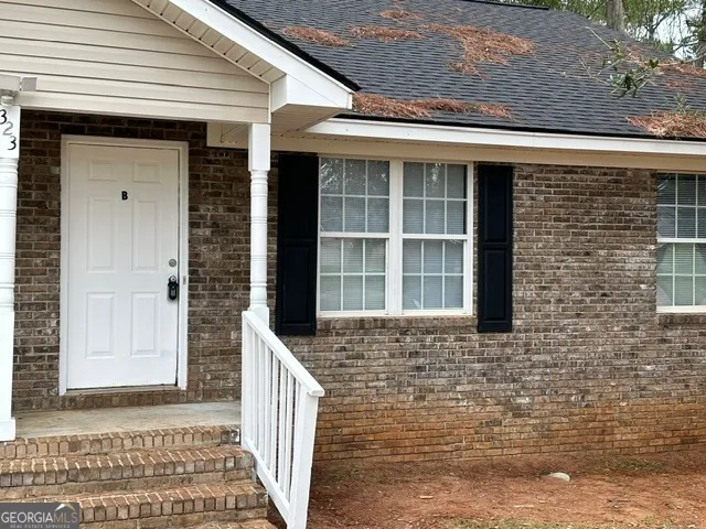 a front view of a house with a window