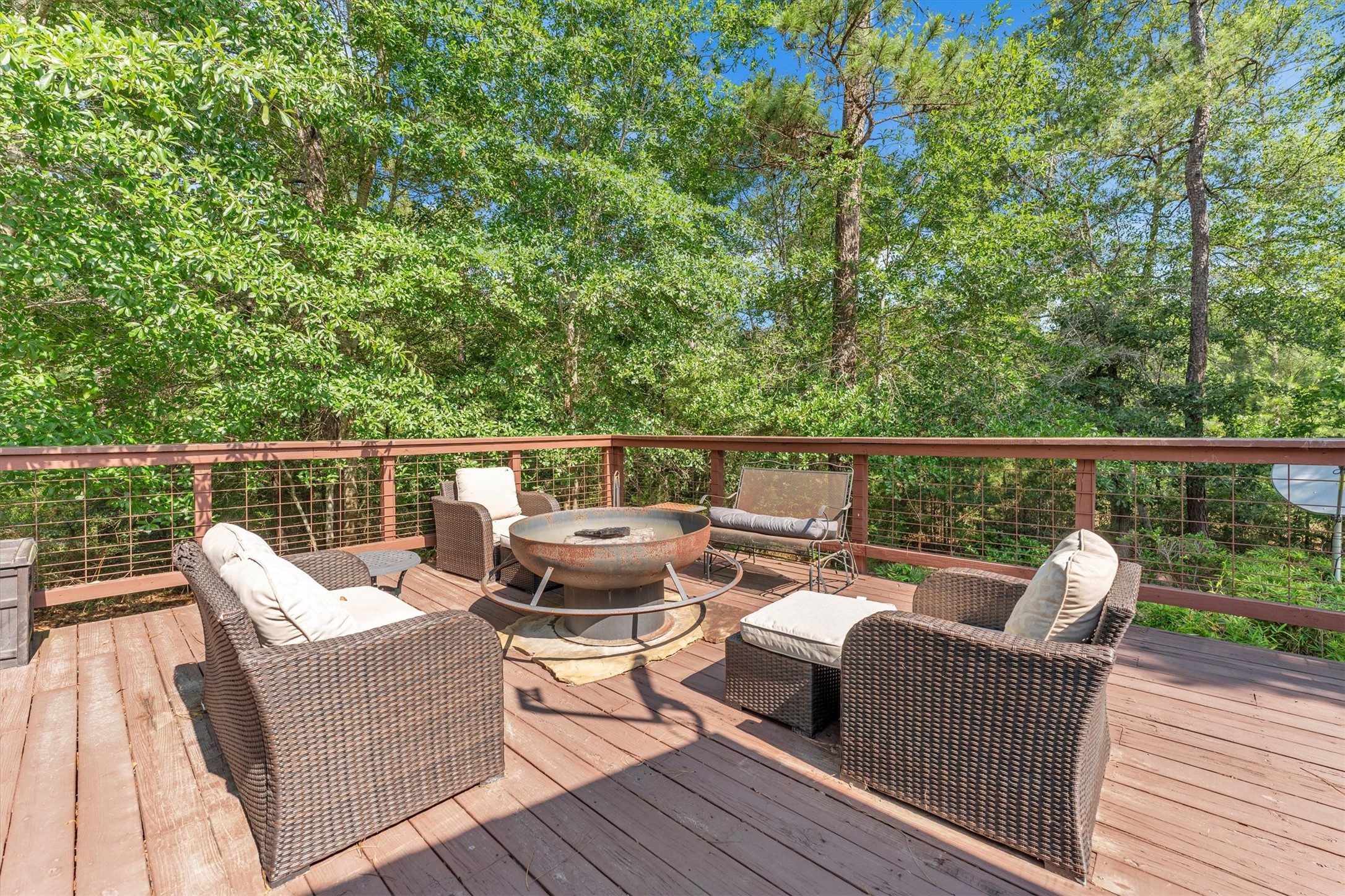 50 Fm 3179 Road Huntsville, TX 77320 - Photo 31 of 45 Outdoor fire pit area creates the perfect setting for entertaining, relaxing, and enjoying evenings under the stars.