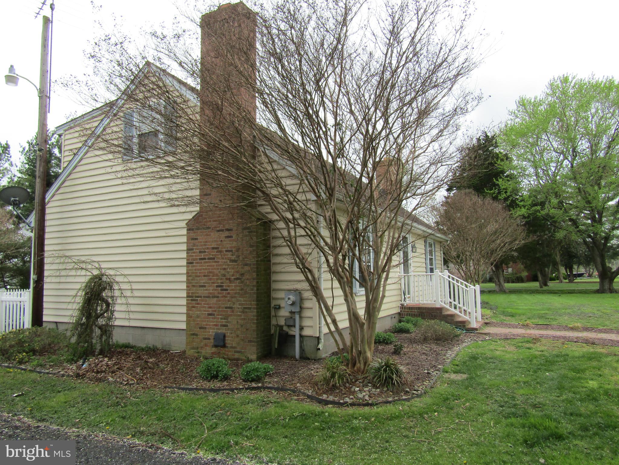 2273 Hudson Road Cambridge, MD 21613 - Photo 3 of 51 Exterior - Side showing 1 of 2 Brick Chimneys