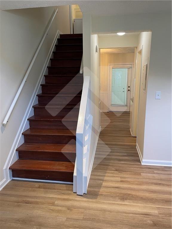 4267 Grogan Street Acworth, GA 30101 - Photo 7 of 37 a view of entryway and gallery with wooden floor