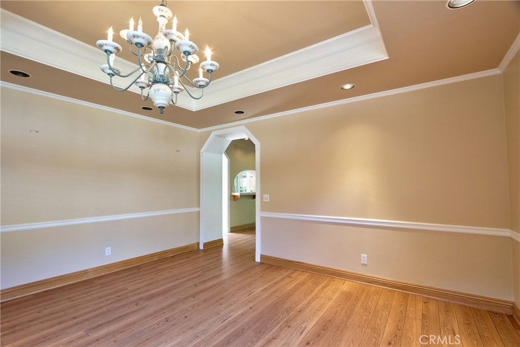46341 El Prado Road Temecula, CA 92590 - Photo 12 of 52 a view of a livingroom with a ceiling fan and wooden floor