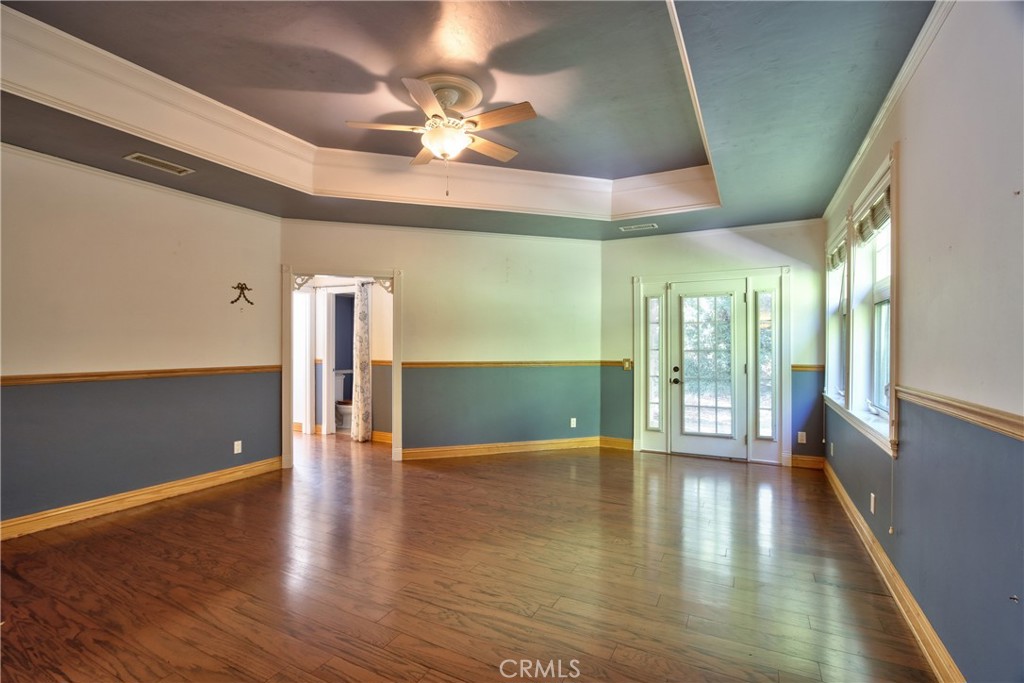 46341 El Prado Road Temecula, CA 92590 - Photo 19 of 52 a view of an empty room with window and wooden floor