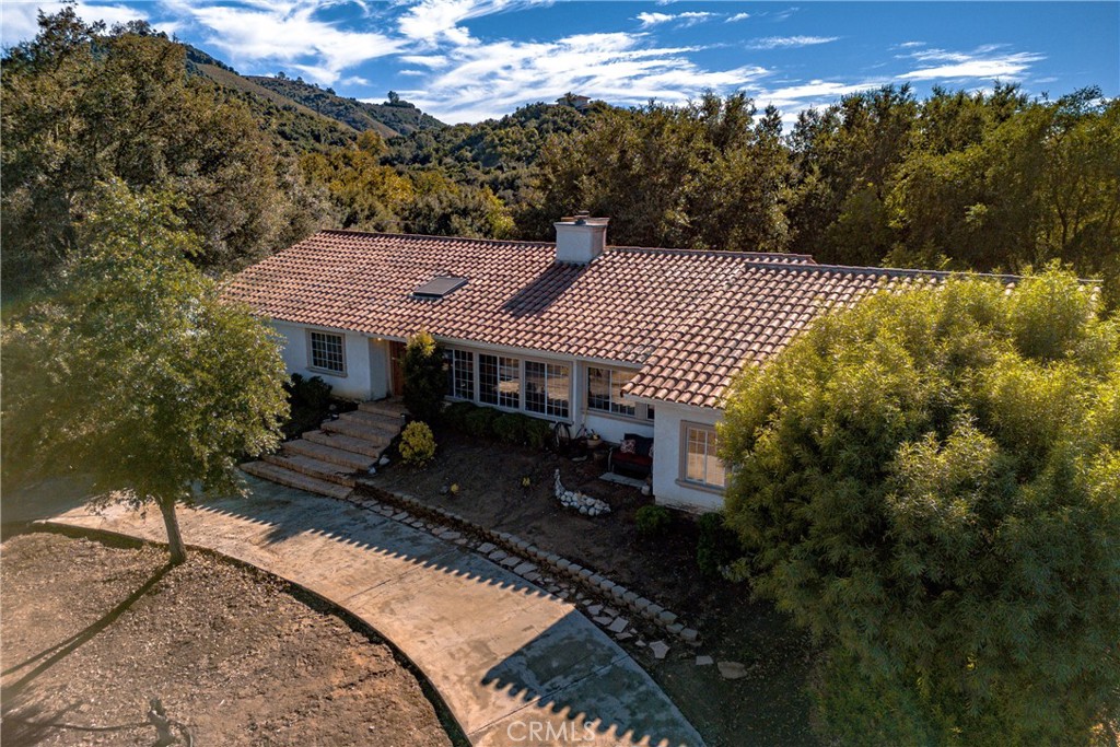 46341 El Prado Road Temecula, CA 92590 - Photo 2 of 52 a front view of a house with a yard