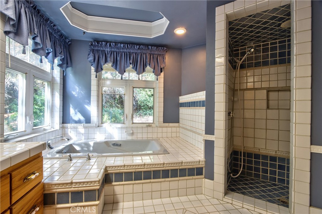 46341 El Prado Road Temecula, CA 92590 - Photo 22 of 52 a view of kitchen with granite countertop a sink and a window