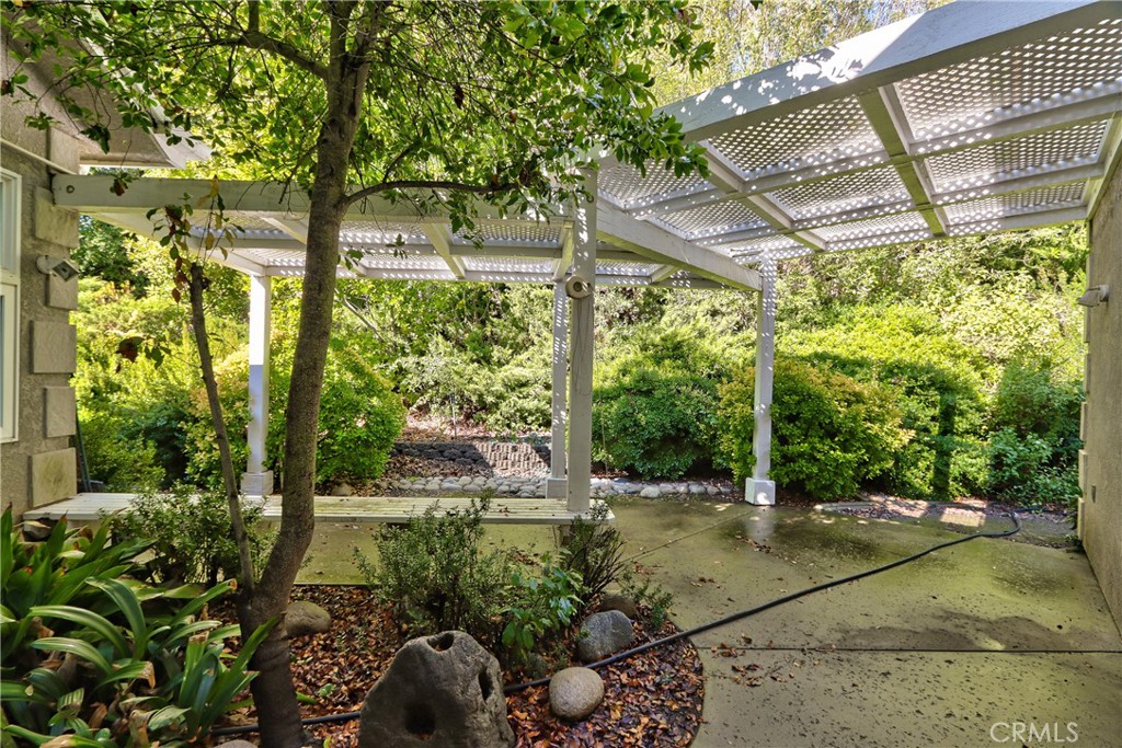 46341 El Prado Road Temecula, CA 92590 - Photo 25 of 52 a view of backyard with plants and outdoor seating