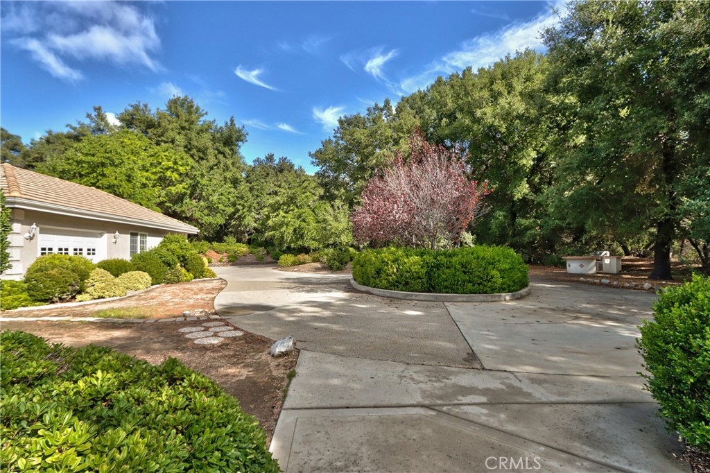 46341 El Prado Road Temecula, CA 92590 - Photo 6 of 52 a view of a street with a trees