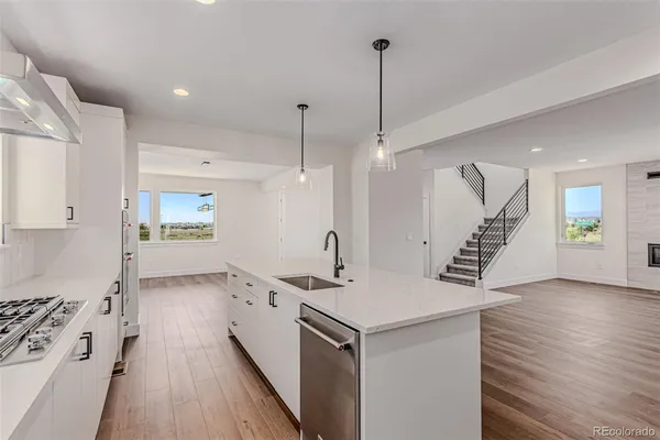a bathroom with a sink and vanity