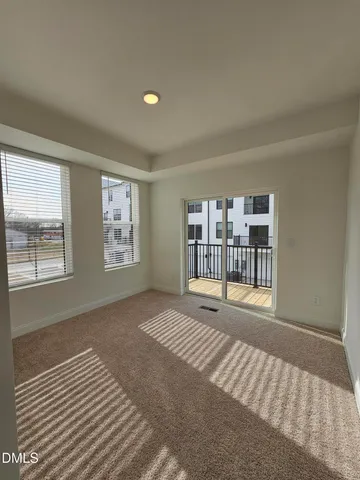a bathroom with a double vanity sink and mirror