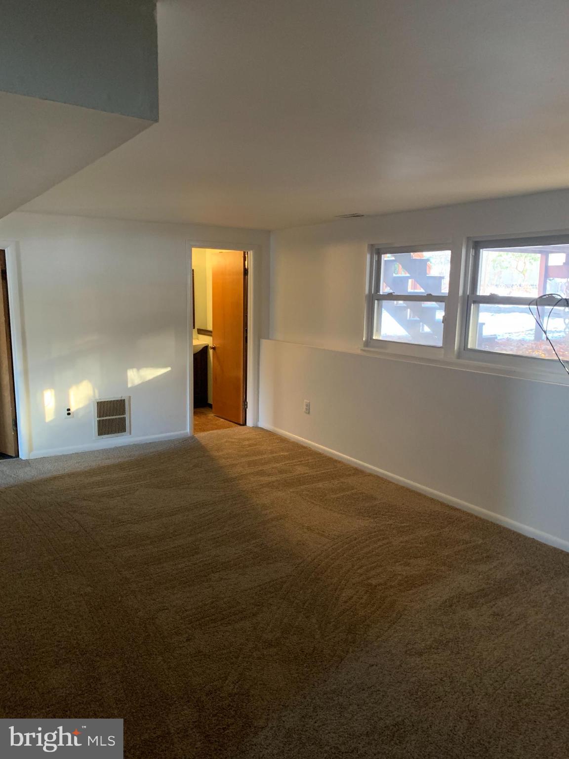 90 Trent Road Blackwood, NJ 08012 - Photo 14 of 24 downstairs living room looking into half bath
