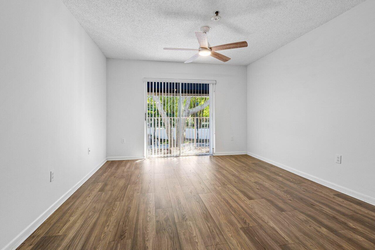 3299 Clint Moore Road, Unit 207 Boca Raton, FL 33496 - Photo 14 of 32 Primary bedroom