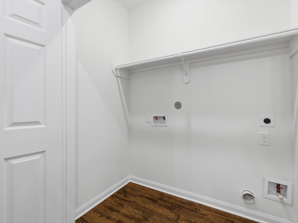 2803 Topiary Lane Houston, TX 77014 - Photo 26 of 30 Thoughtfully positioned for everyday convenience, the utility room offers a dedicated space for laundry and household organization.