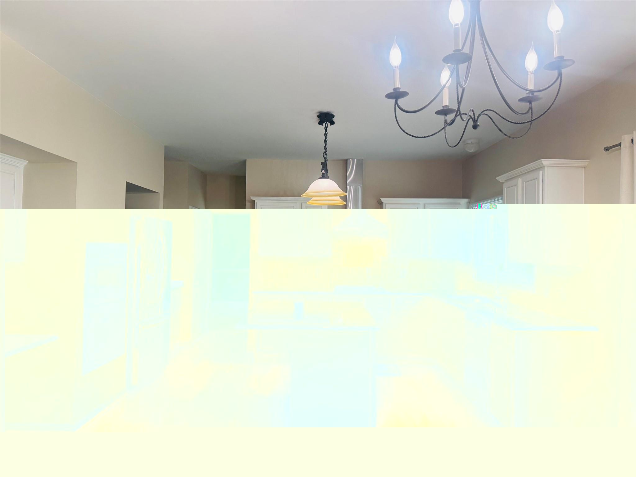 171 Millstone Road Troy, MI 48084 - Photo 14 of 43 White kitchen cabinets with granite counter