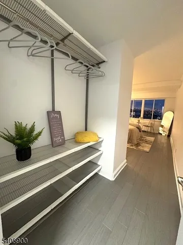 a bedroom with a bed and a table