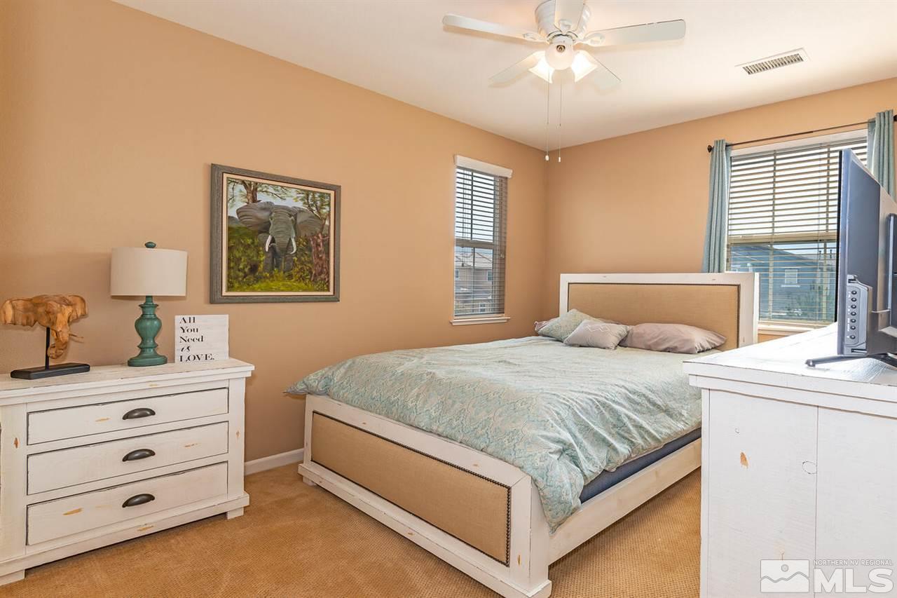 2065 Bears Ranch Drive Reno, NV 89521 - Photo 13 of 20 a bedroom with a bed and a dresser