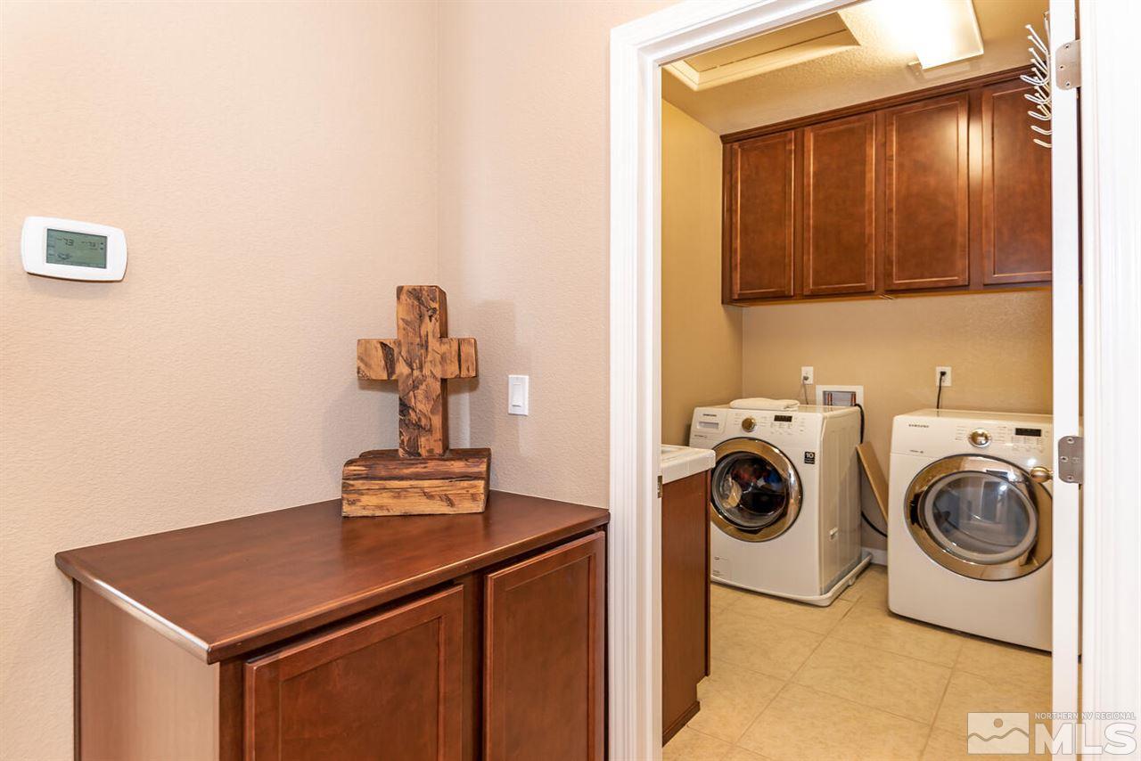 2065 Bears Ranch Drive Reno, NV 89521 - Photo 16 of 20 a utility room with sink dryer and washer