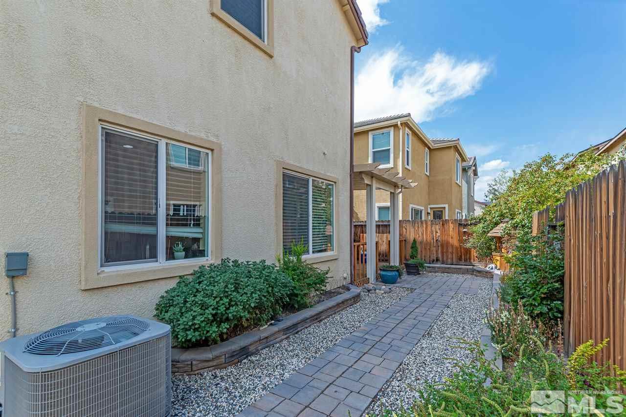 2065 Bears Ranch Drive Reno, NV 89521 - Photo 20 of 20 a view of a front door and potted plants