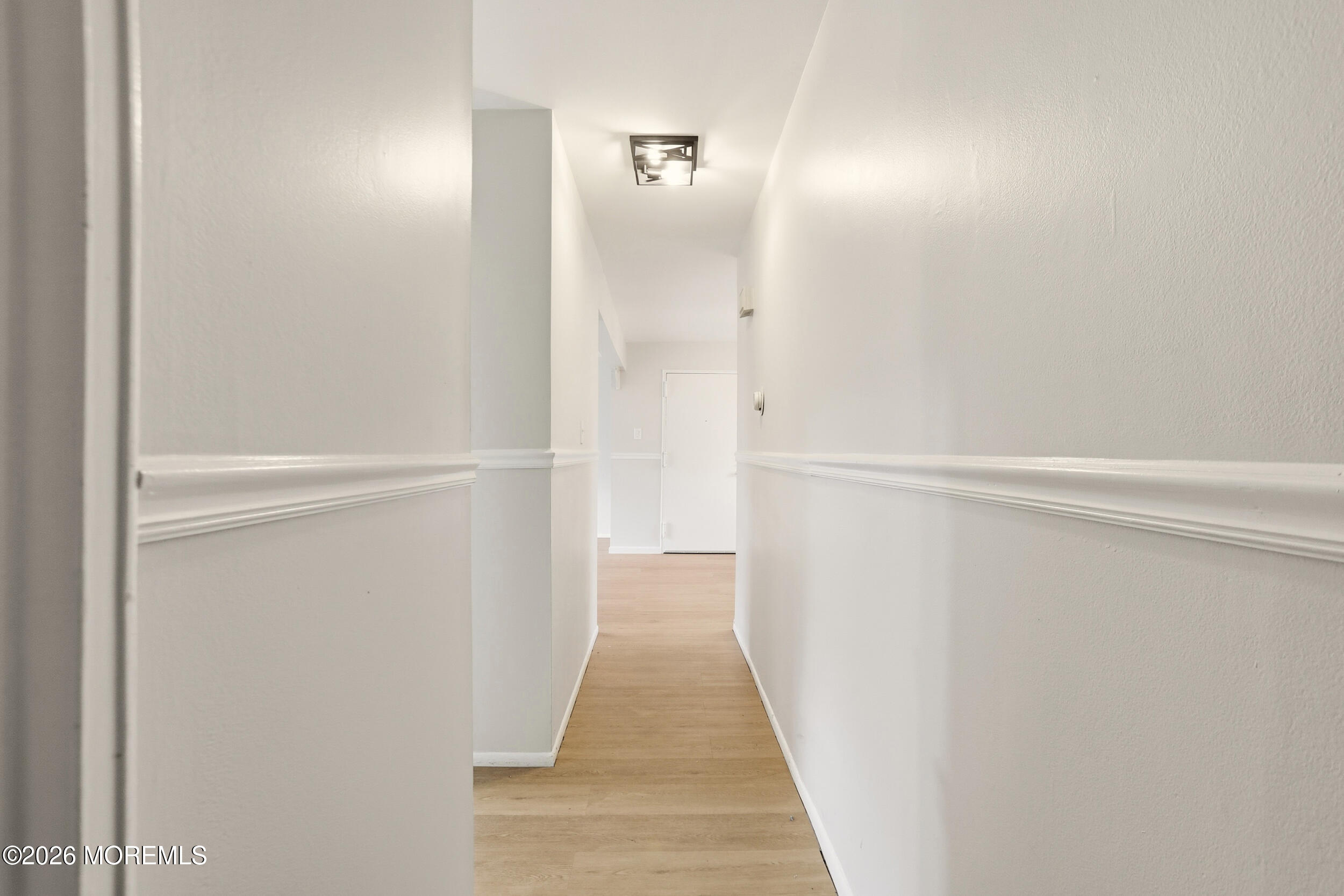 194 Sawmill Road, Unit 480 Brick, NJ 08724 - Photo 12 of 20 a view of a hallway