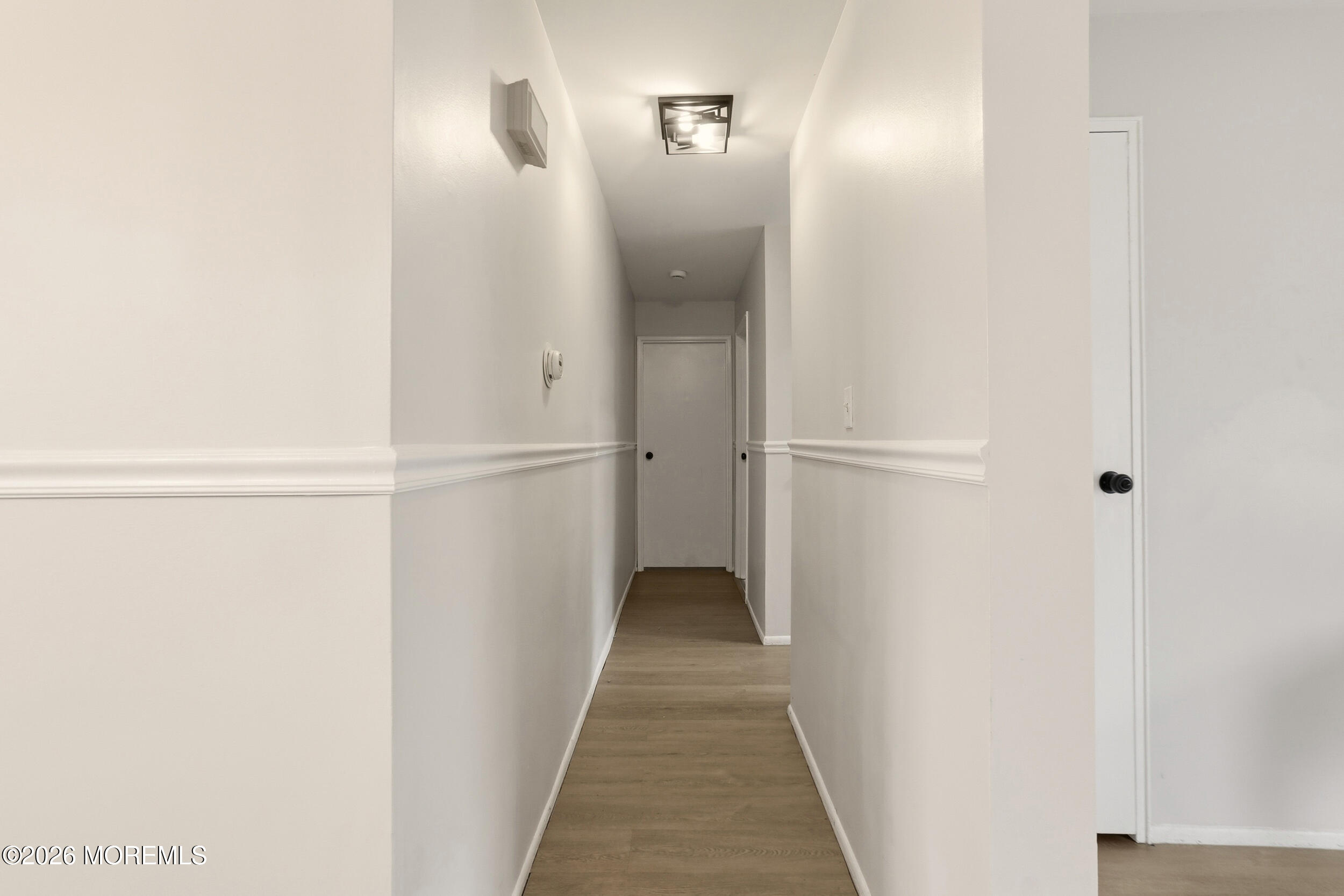 194 Sawmill Road, Unit 480 Brick, NJ 08724 - Photo 13 of 20 a view of a hallway