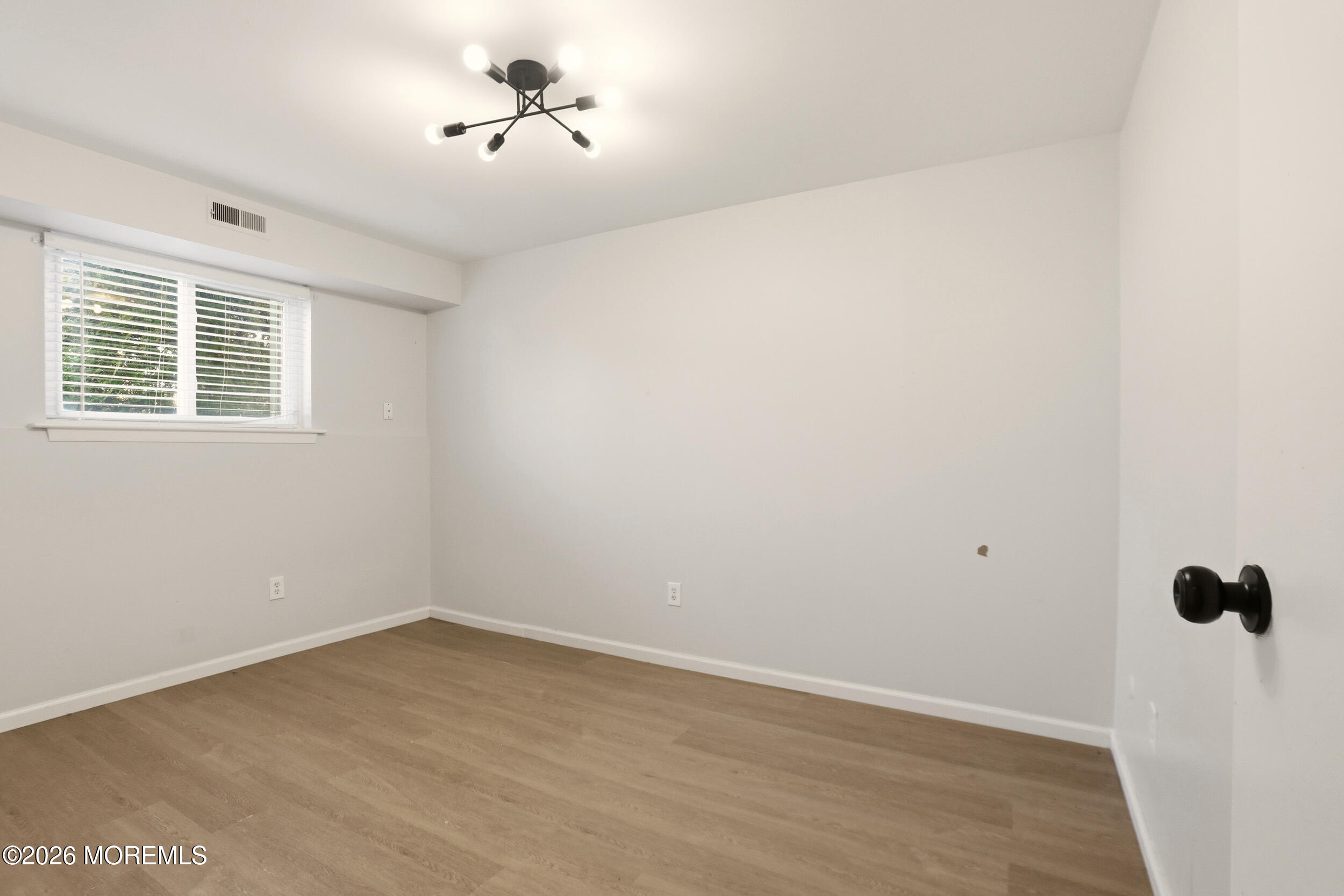 194 Sawmill Road, Unit 480 Brick, NJ 08724 - Photo 9 of 20 wooden floor in an empty room