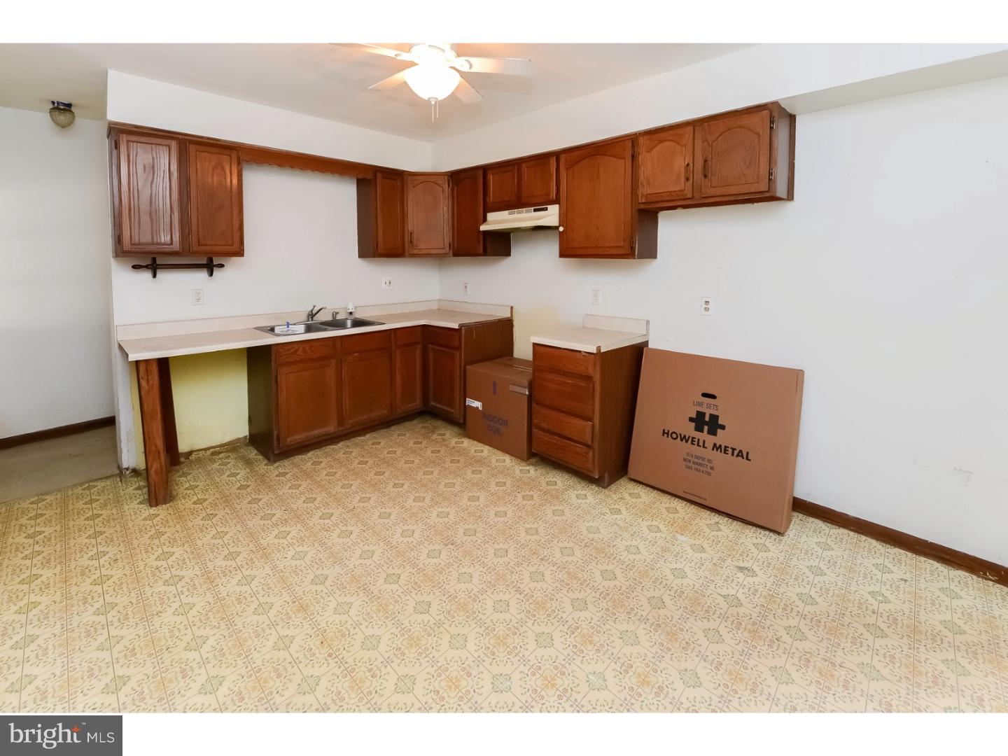 200 Pitman Avenue Pitman, NJ 08071 - Photo 11 of 59 a kitchen with cabinets and a sink