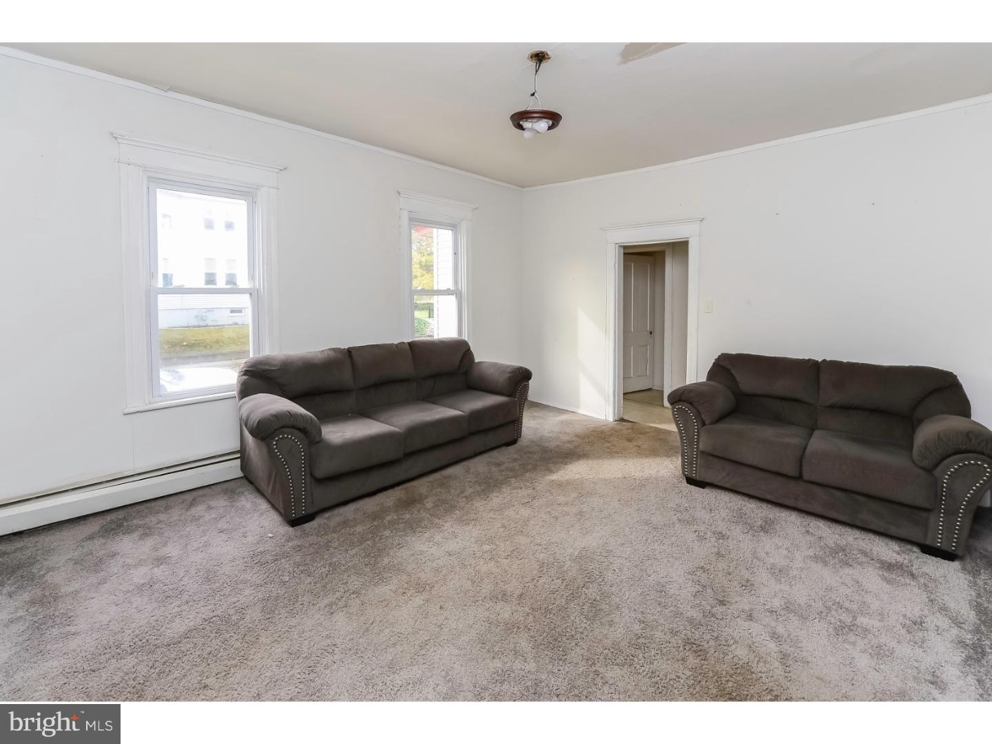 200 Pitman Avenue Pitman, NJ 08071 - Photo 6 of 59 a living room with furniture and a window