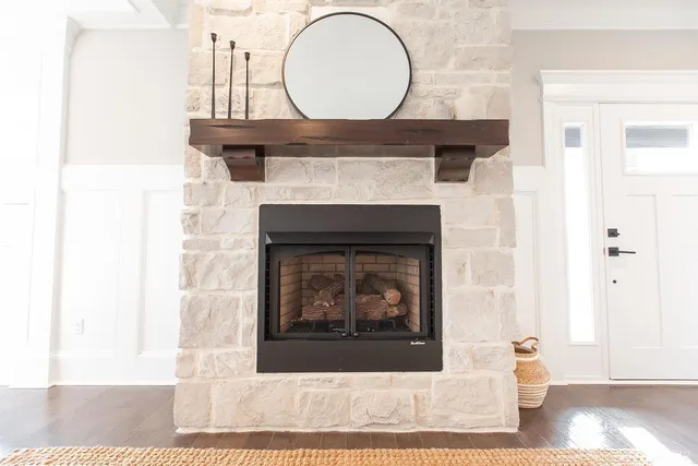 a kitchen with kitchen island white cabinets and refrigerator