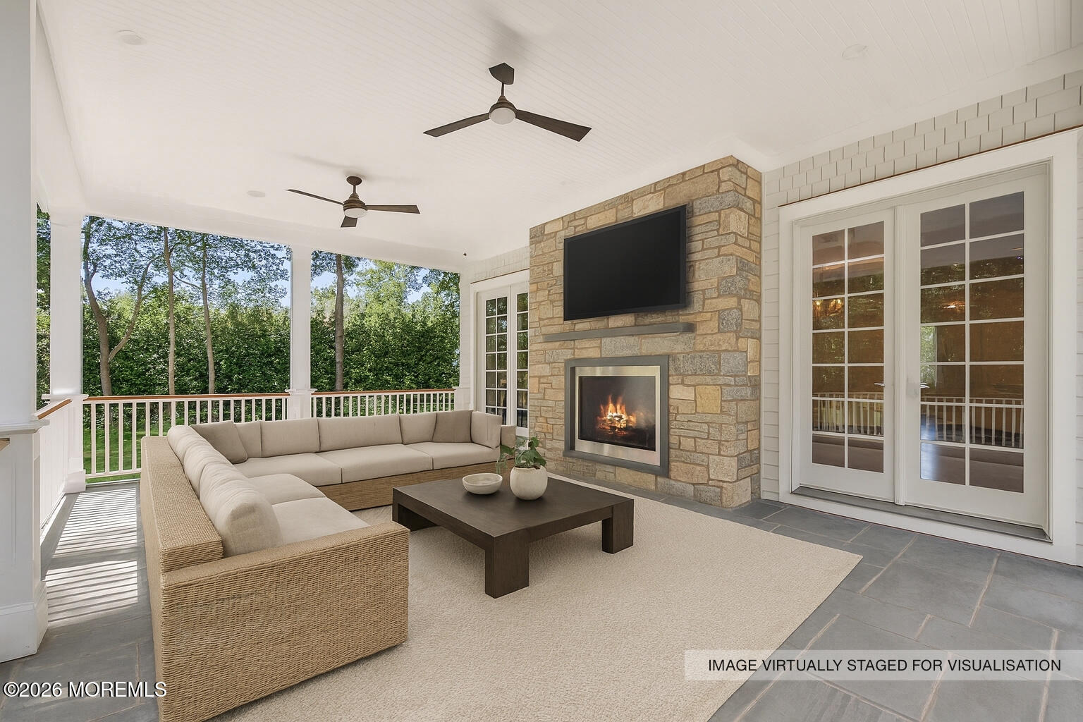 4 Club Way Rumson, NJ 07760 - Photo 13 of 79 a living room with furniture a fireplace and a flat screen tv