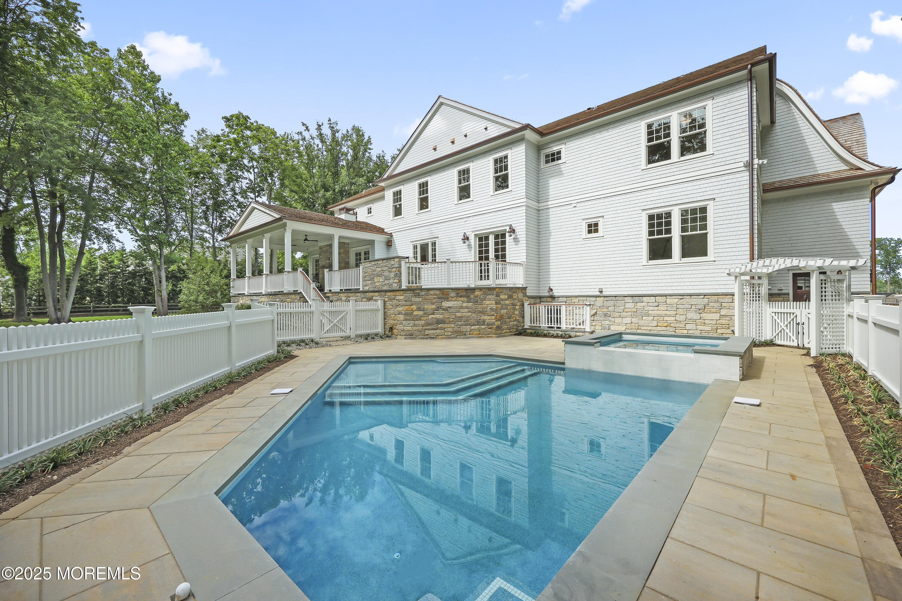 4 Club Way Rumson, NJ 07760 - Photo 17 of 79 a front view of a house with swimming pool