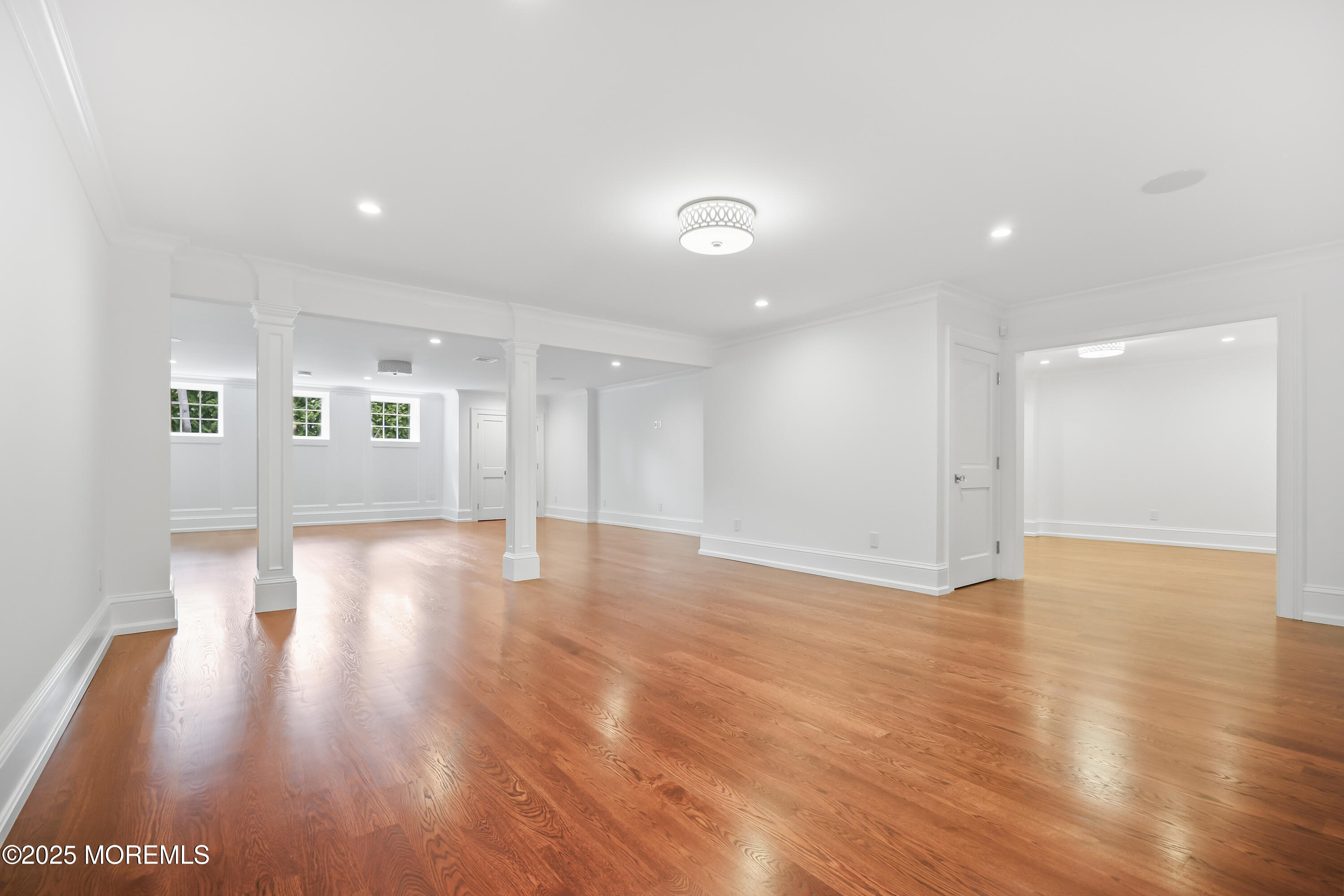 4 Club Way Rumson, NJ 07760 - Photo 28 of 79 a view of an empty room with wooden floor and a window
