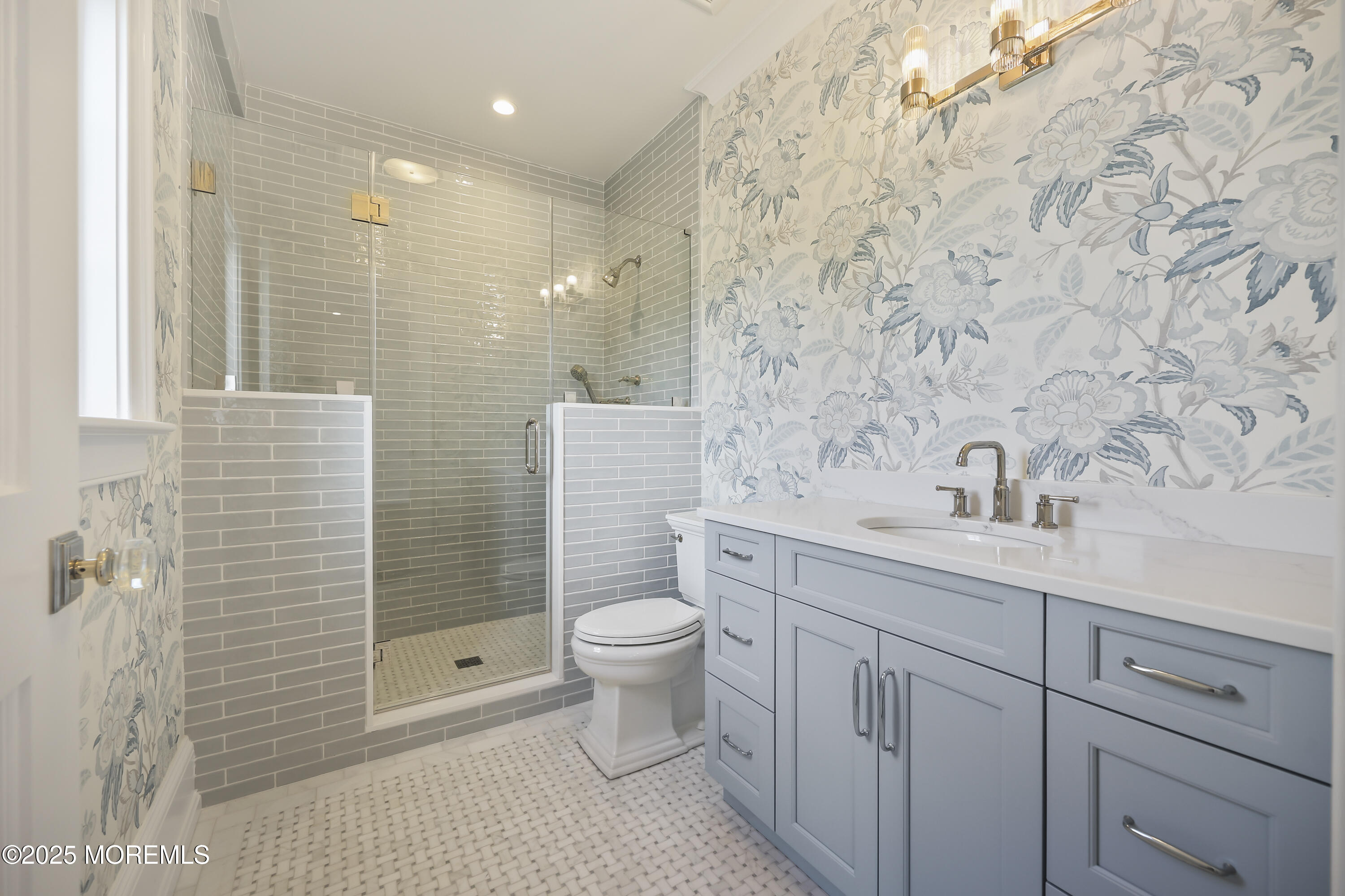 4 Club Way Rumson, NJ 07760 - Photo 42 of 79 a bathroom with a sink a toilet and shower