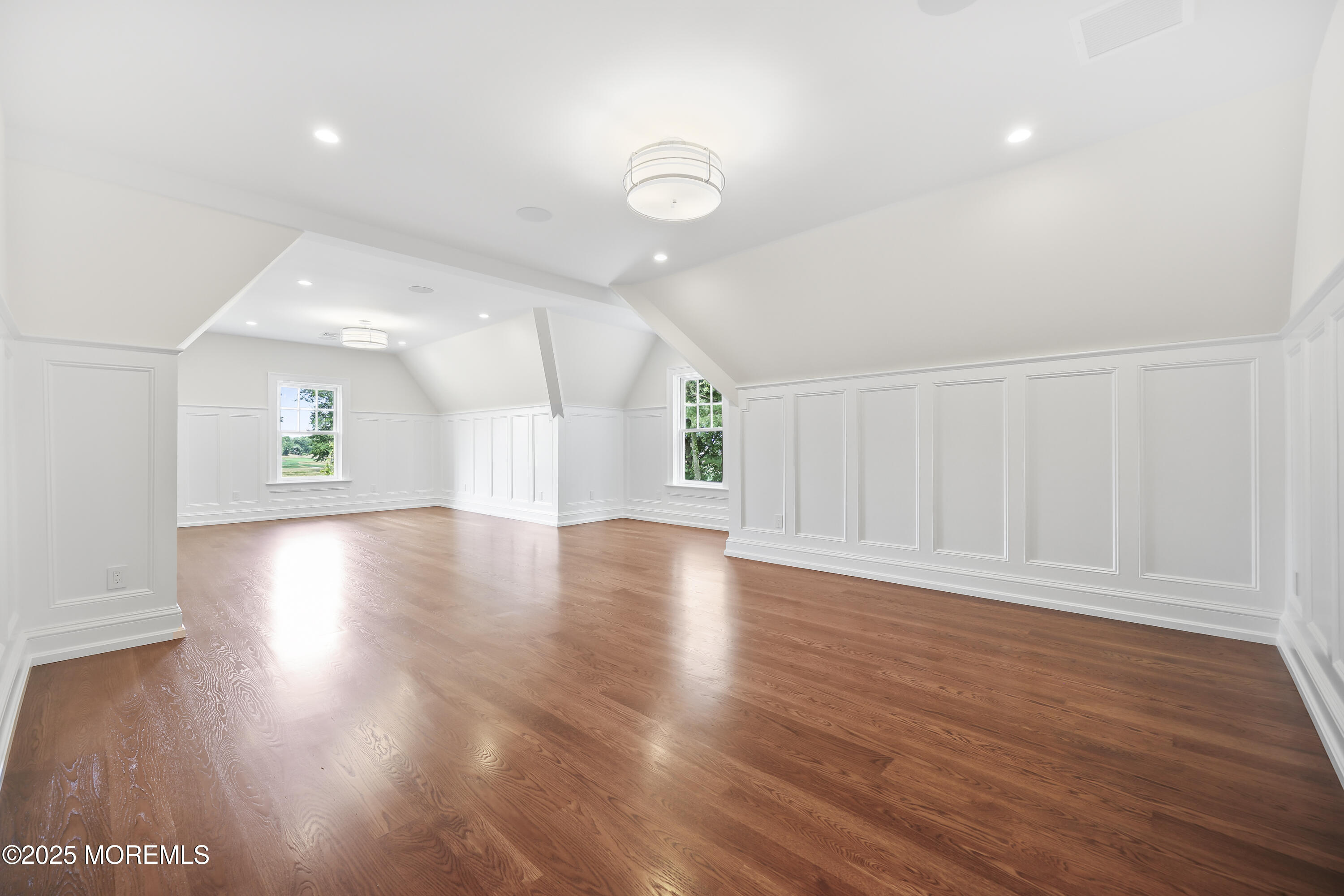 4 Club Way Rumson, NJ 07760 - Photo 50 of 79 an empty room with wooden floor and windows