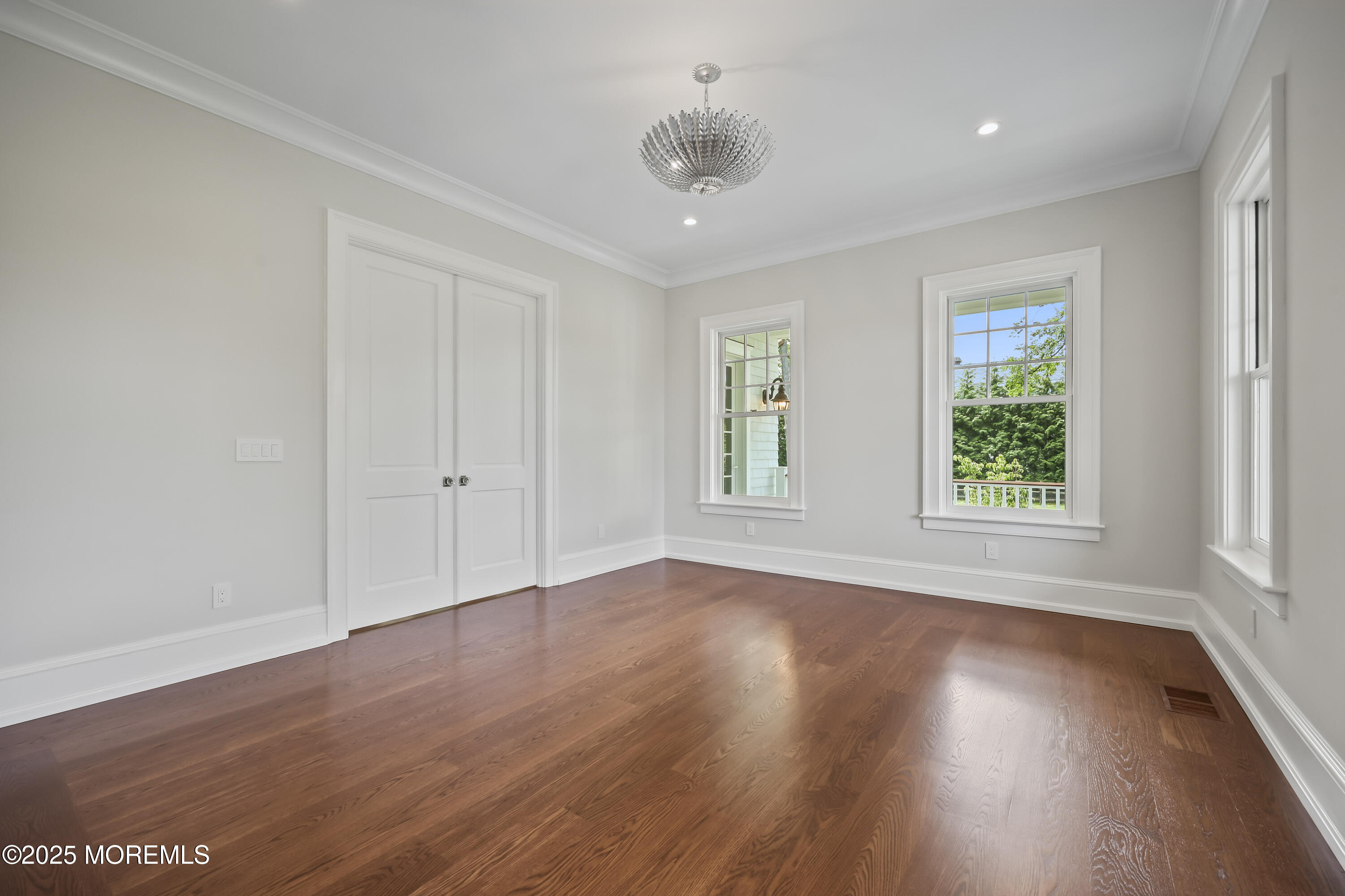 4 Club Way Rumson, NJ 07760 - Photo 62 of 79 an empty room with wooden floor and windows