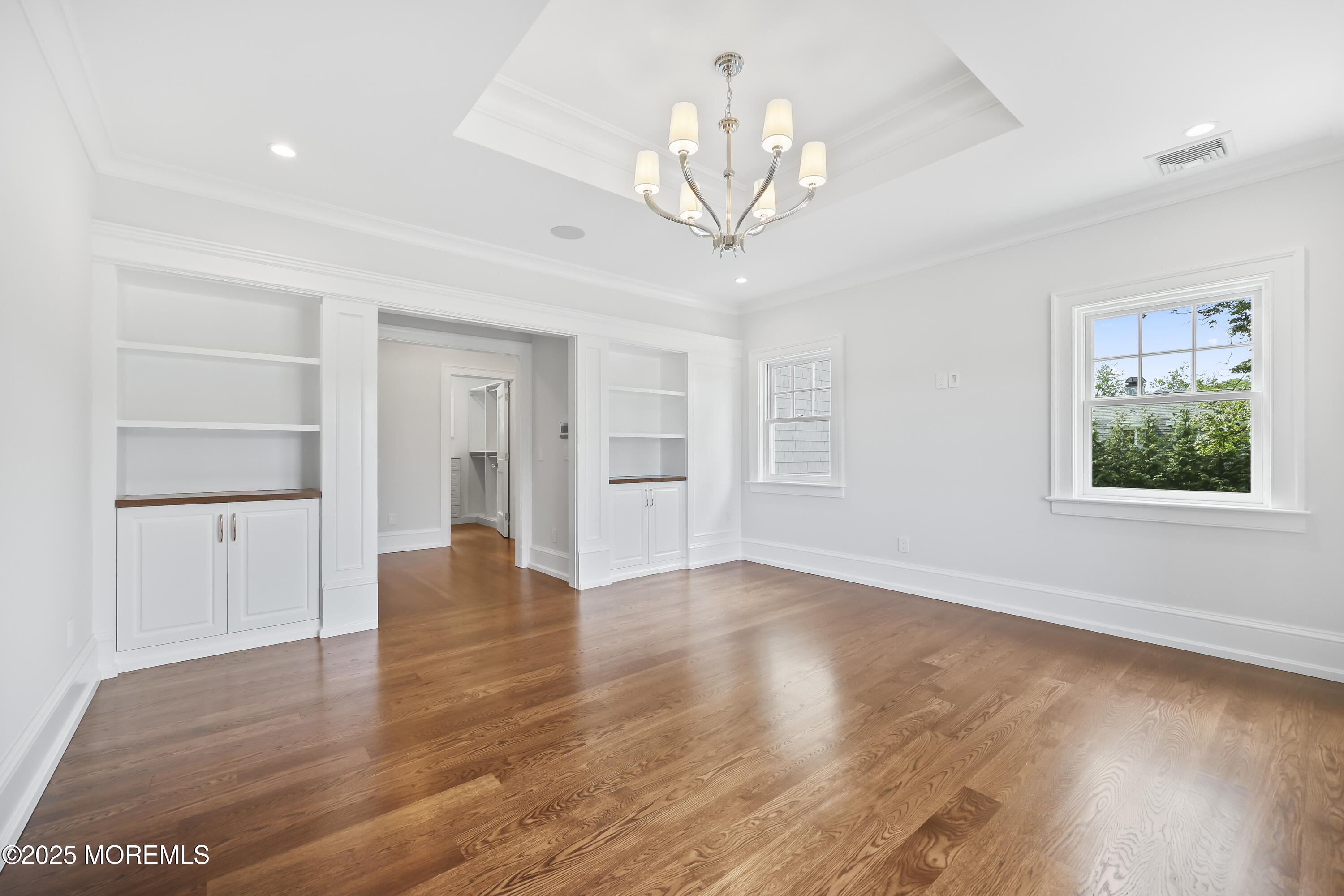 4 Club Way Rumson, NJ 07760 - Photo 75 of 79 a view of an empty room with wooden floor and a window