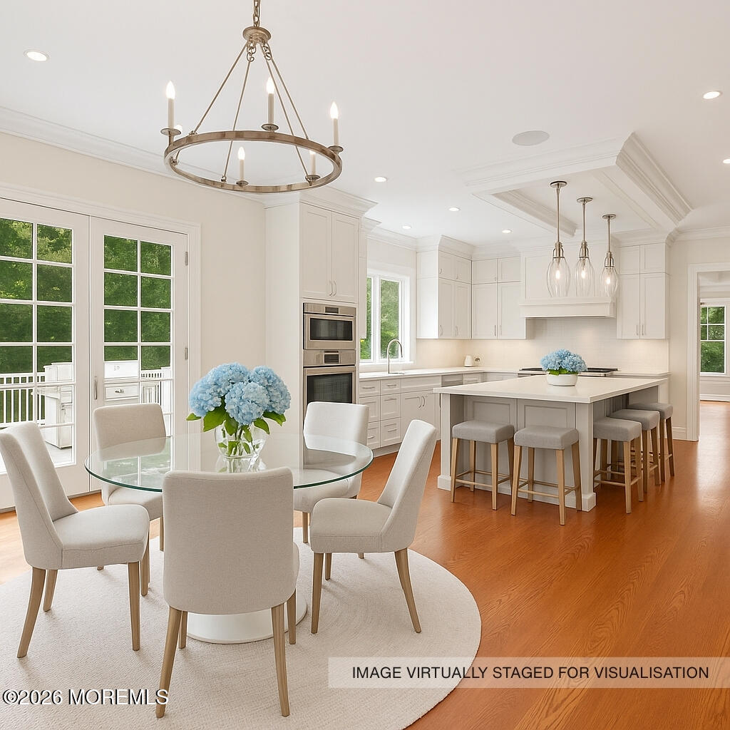 4 Club Way Rumson, NJ 07760 - Photo 9 of 79 a dining room with furniture a livingroom and chandelier