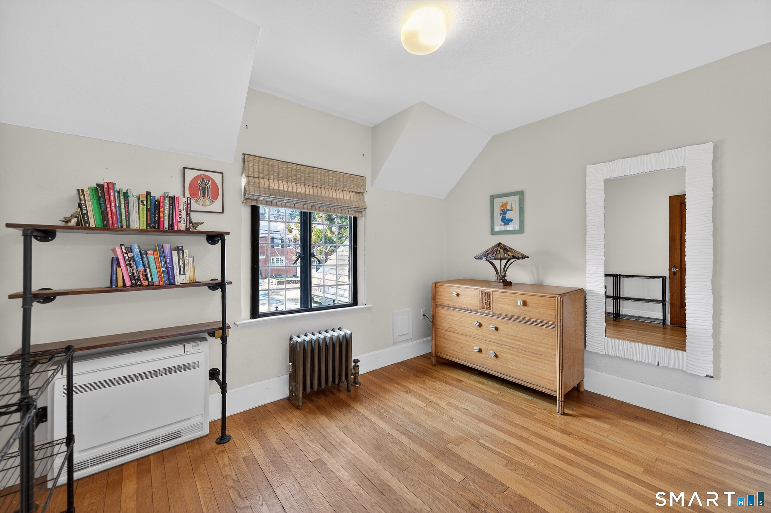 80 Santa Fe Avenue Hamden, CT 06517 - Photo 22 of 28 a room with furniture and a wooden floor
