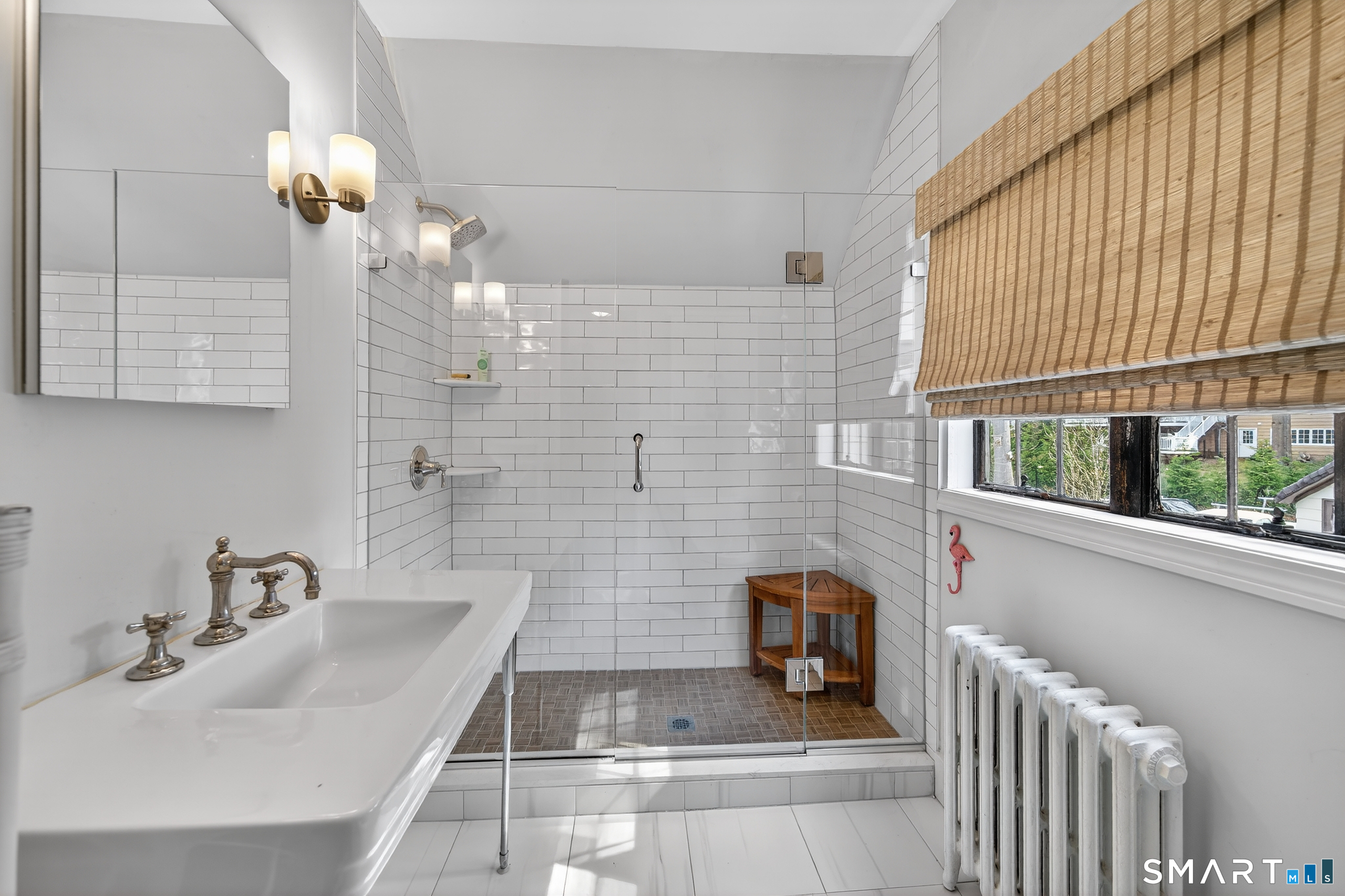80 Santa Fe Avenue Hamden, CT 06517 - Photo 23 of 28 a bathroom with a sink bath tub and shower
