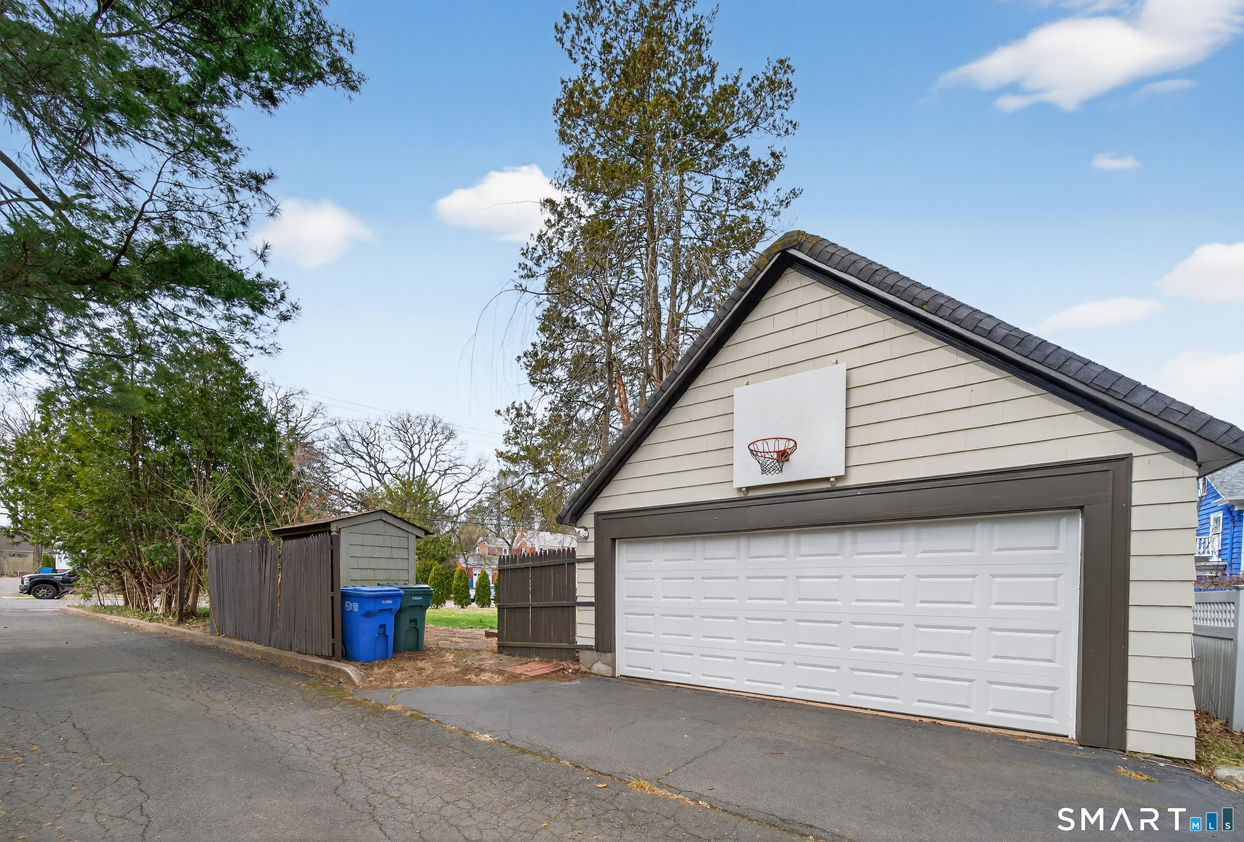 80 Santa Fe Avenue Hamden, CT 06517 - Photo 28 of 28 a front view of a house with a tree
