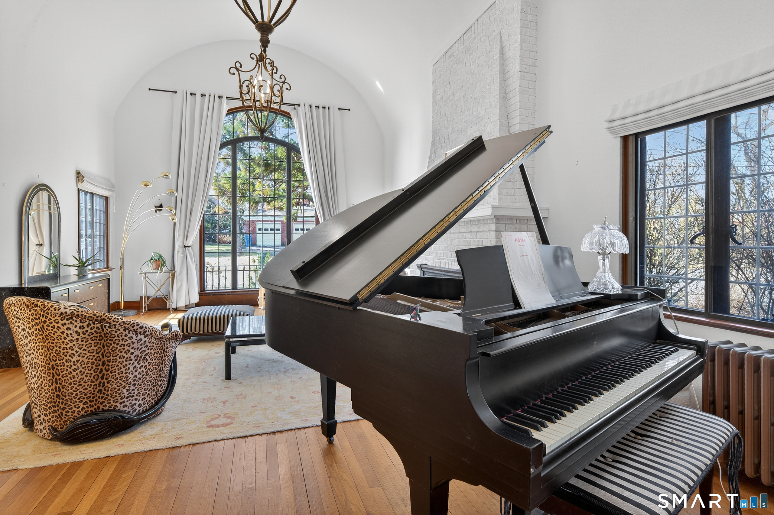80 Santa Fe Avenue Hamden, CT 06517 - Photo 7 of 28 a living room with furniture and a piano