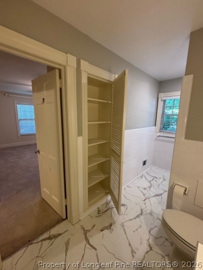 1513 Raeford Road Fayetteville, NC 28305 - Photo 15 of 25 a bathroom with a shower and a toilet