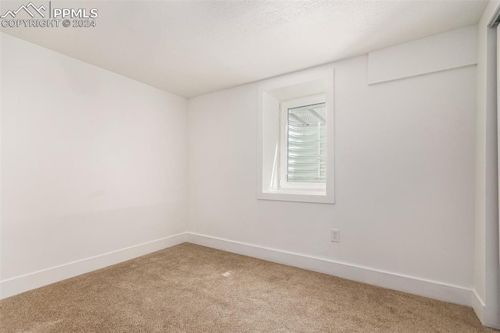 737 Utica Street Denver, CO 80204 - Photo 26 of 41 an empty room with a window