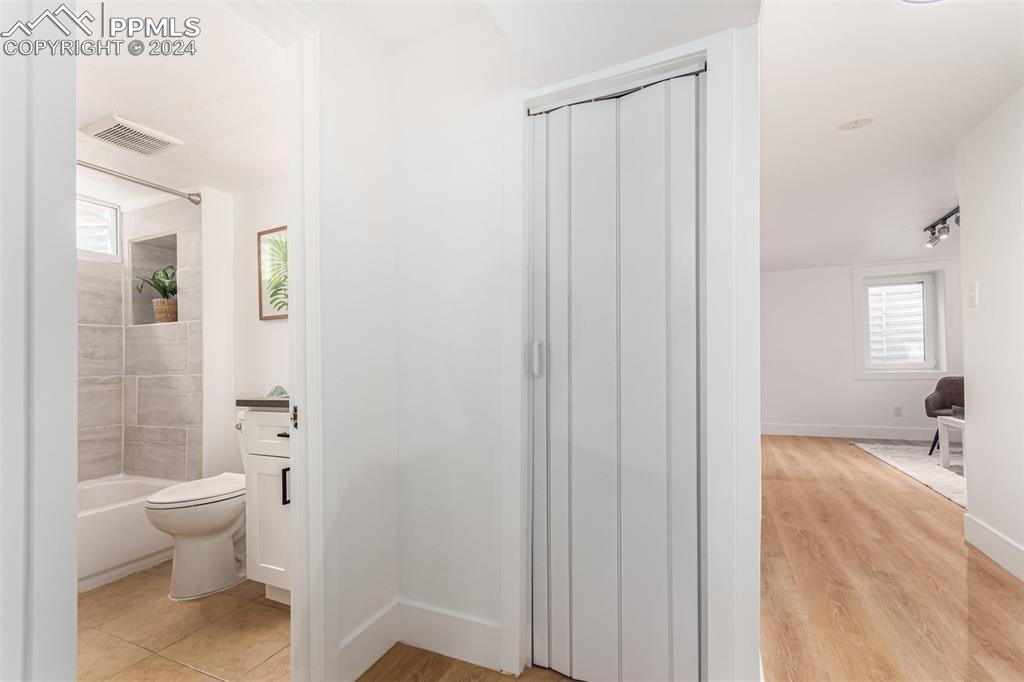 737 Utica Street Denver, CO 80204 - Photo 30 of 41 a bathroom with a toilet and a shower