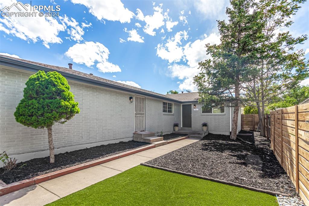 737 Utica Street Denver, CO 80204 - Photo 3 of 41 a house view with a garden space