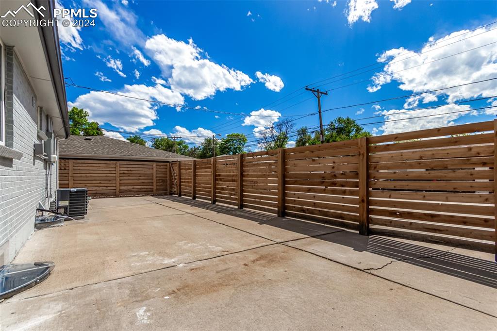 737 Utica Street Denver, CO 80204 - Photo 36 of 41 a view of a house with a yard