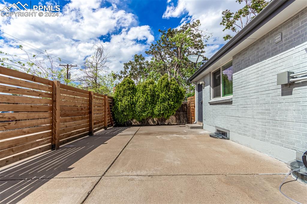737 Utica Street Denver, CO 80204 - Photo 38 of 41 a view of a backyard with sitting area