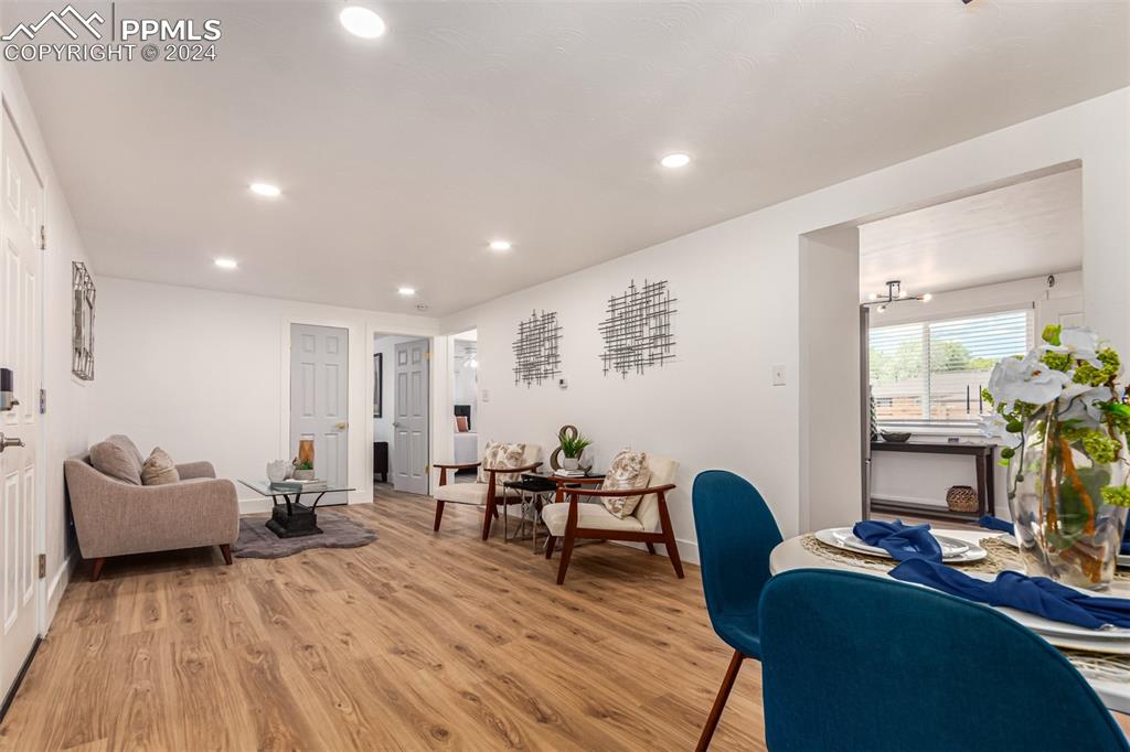 737 Utica Street Denver, CO 80204 - Photo 7 of 41 a living room with furniture and a wooden floor