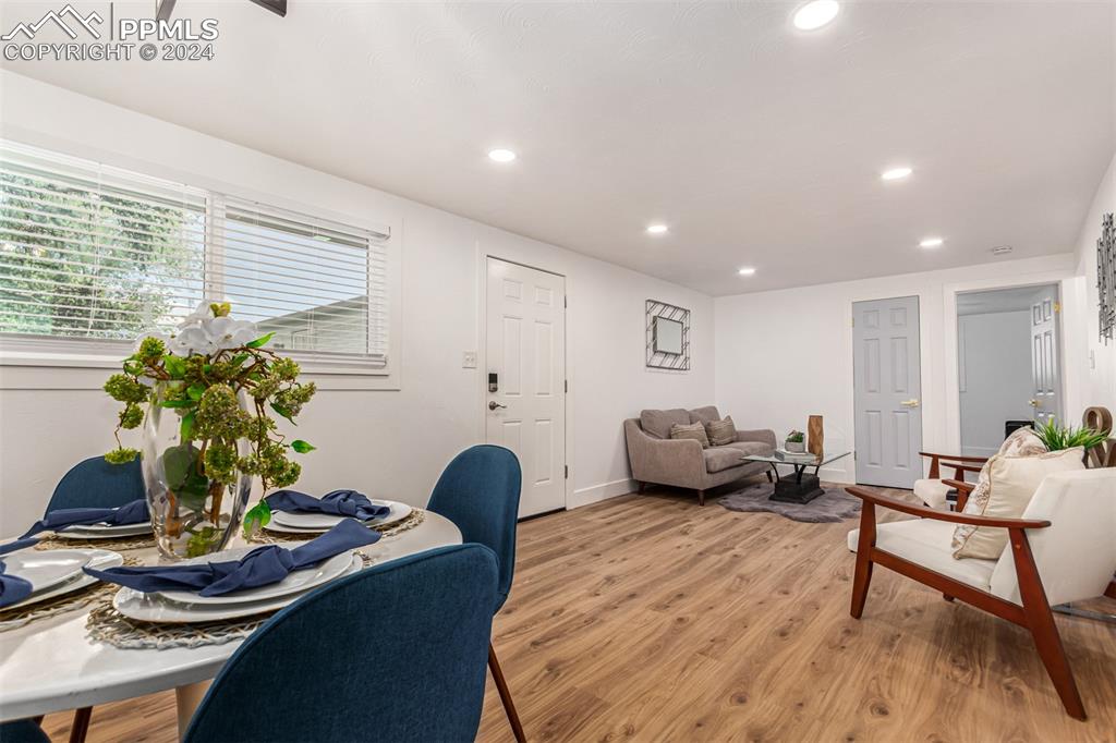 737 Utica Street Denver, CO 80204 - Photo 8 of 41 a living room with furniture and a potted plant
