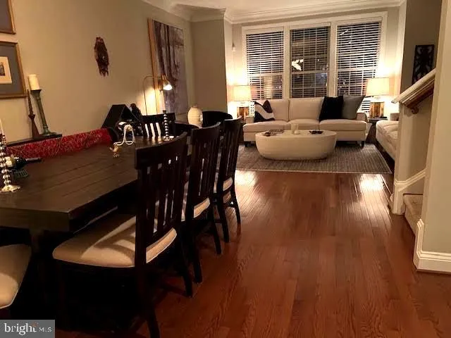 a kitchen with granite countertop a sink stove and cabinets