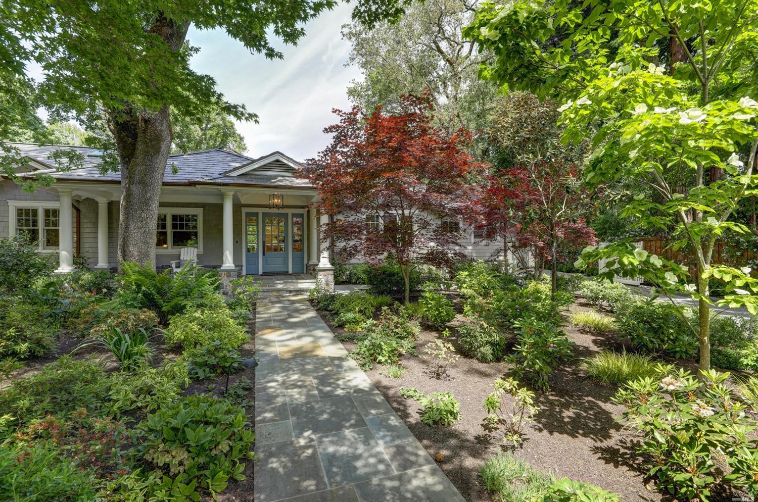 10 Ames Avenue Ross, CA 94957 - Photo 1 of 1 a front view of a house with a yard