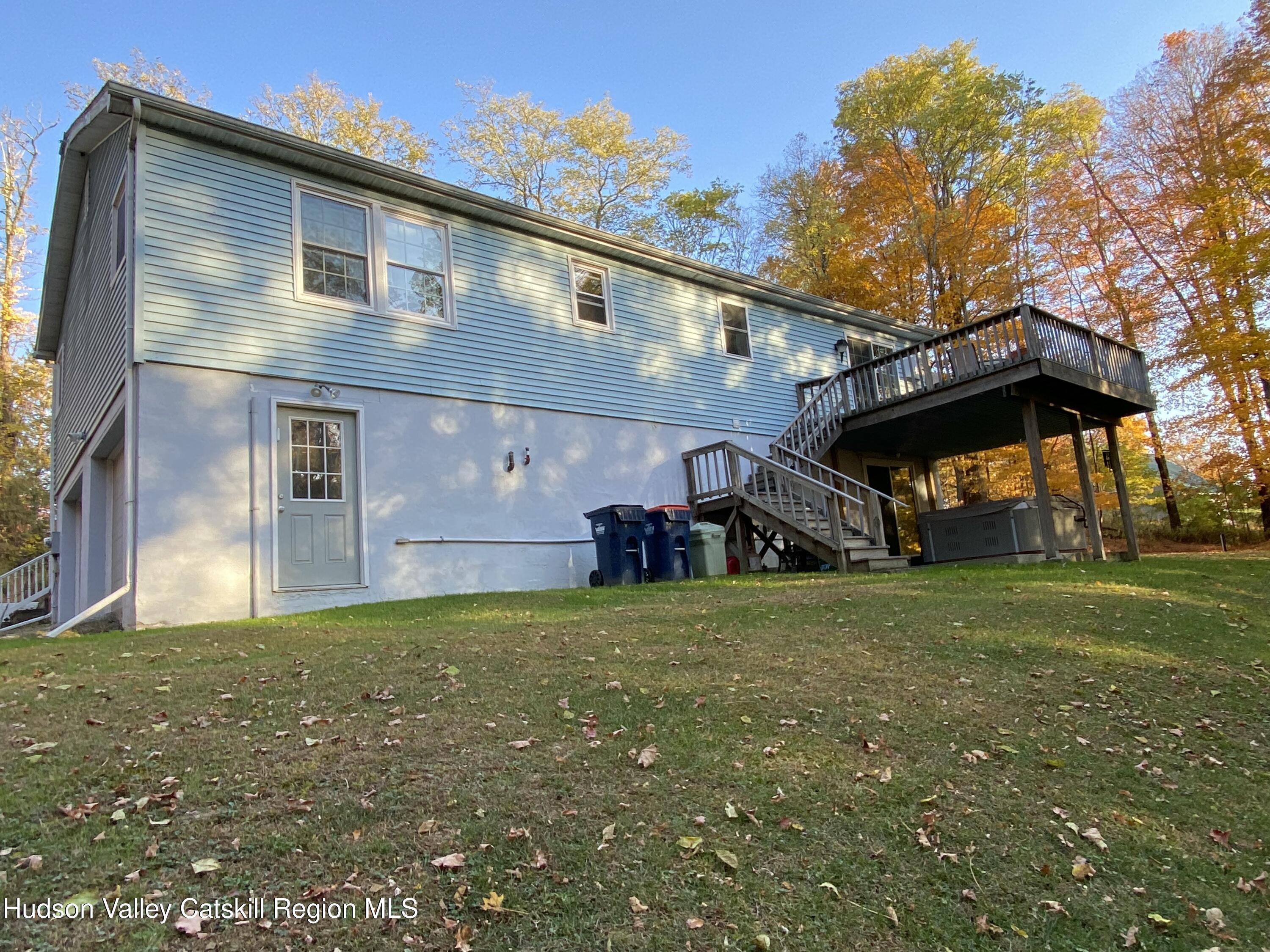 22 Beacham Road Rhinebeck, NY 12572 - Photo 18 of 38 a view of a house with a back yard